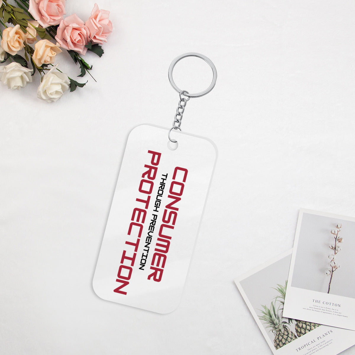 Regulator's Precision Double-Sided Acrylic Keychain - Consumer Protection Through Prevention